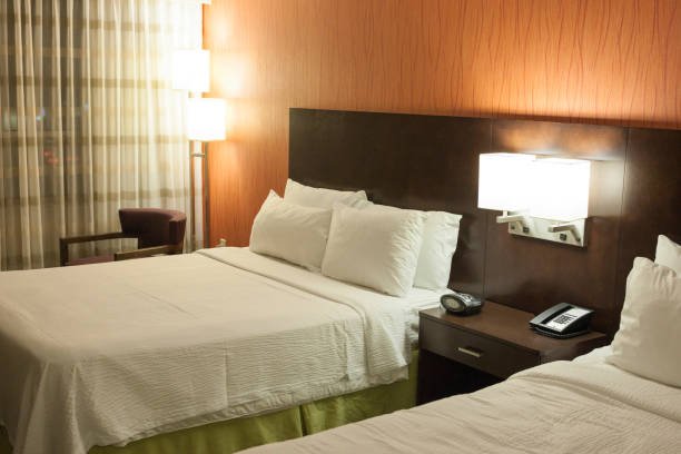 Modern Style Bedroom with Two Beds. Horizontal Image